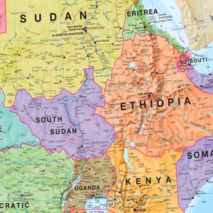May include: A detailed map of Northeast Africa, showing countries like Sudan, Ethiopia, and Kenya. The map uses different colours to show geographical areas, with labels for cities, water bodies, and political borders. It's a visual guide to the region, with measurements in kilometers.