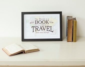 May include: A black framed print with a quote about travel. The quote reads "The World is a BOOK and those who do not TRAVEL read only a page." The quote is attributed to "Suzi Augustine".