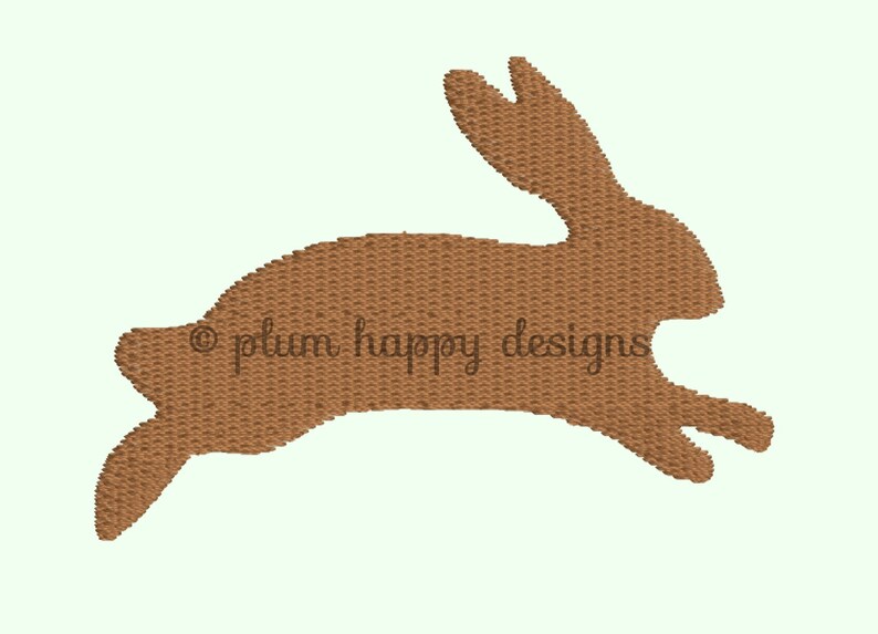 May include: A brown silhouette of a rabbit jumping, with the text "plum happy designs" in the center.