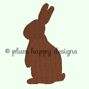 May include: A brown rabbit silhouette, a simple design for embroidery or crafting projects.