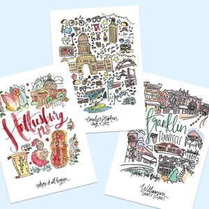 May include: Three watercolor art prints featuring hand-drawn illustrations of cities. One print says "Hattiesburg MS" with illustrations of local landmarks. Another says "Austin" with a date and names. The third says "Franklin Tennessee".