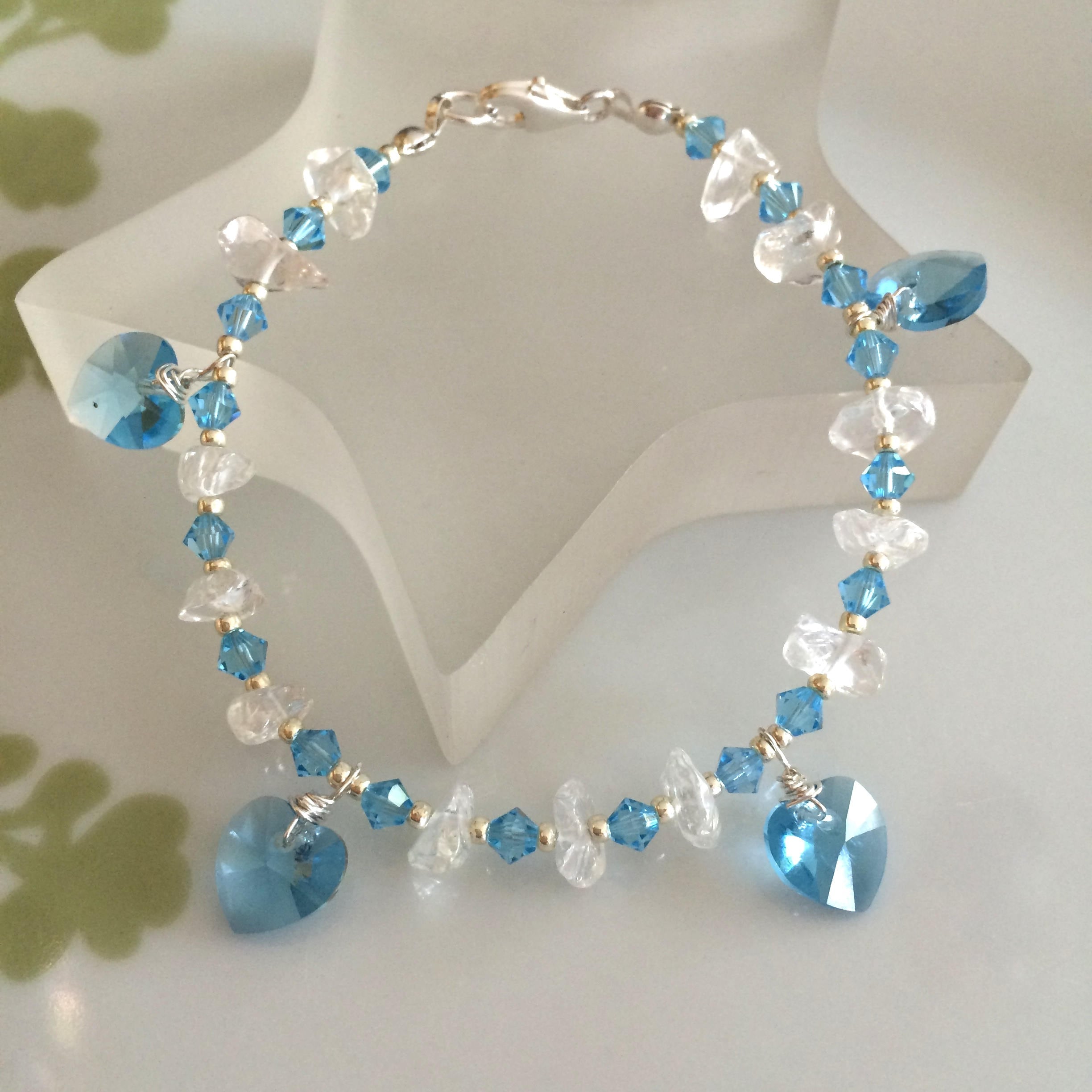 Aqua blue Swarovski crystal heart bracelet with clear Rock Crystal ...