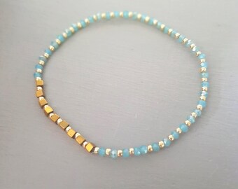 Tiny Blue Aquamarine crystal stretch bracelet with gold Hematite gemstone beads minimalist stacking March Birthstone Jewellery gift for her