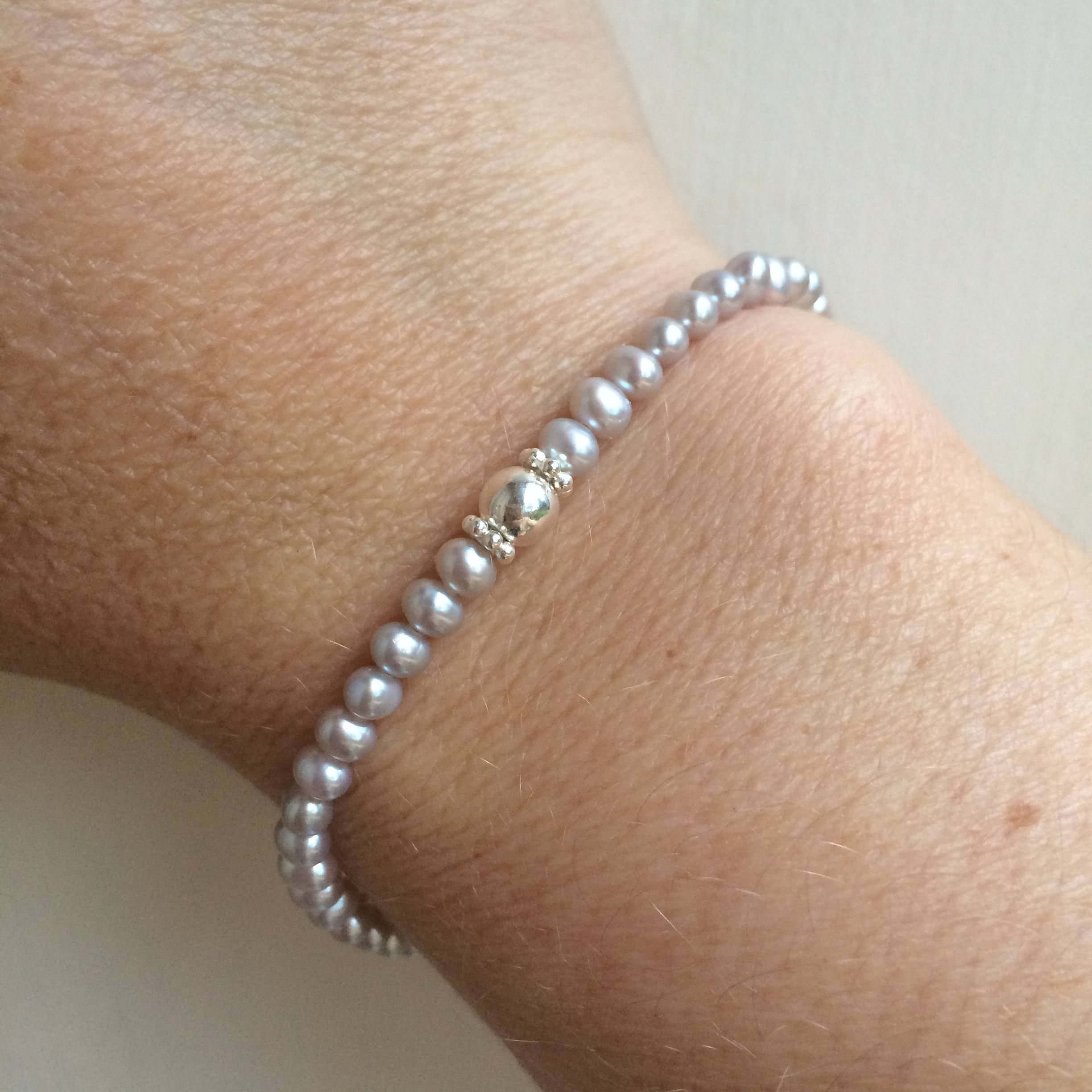 Skinny Grey Freshwater Seed Pearl Stretch Bracelet With Sterling Silver