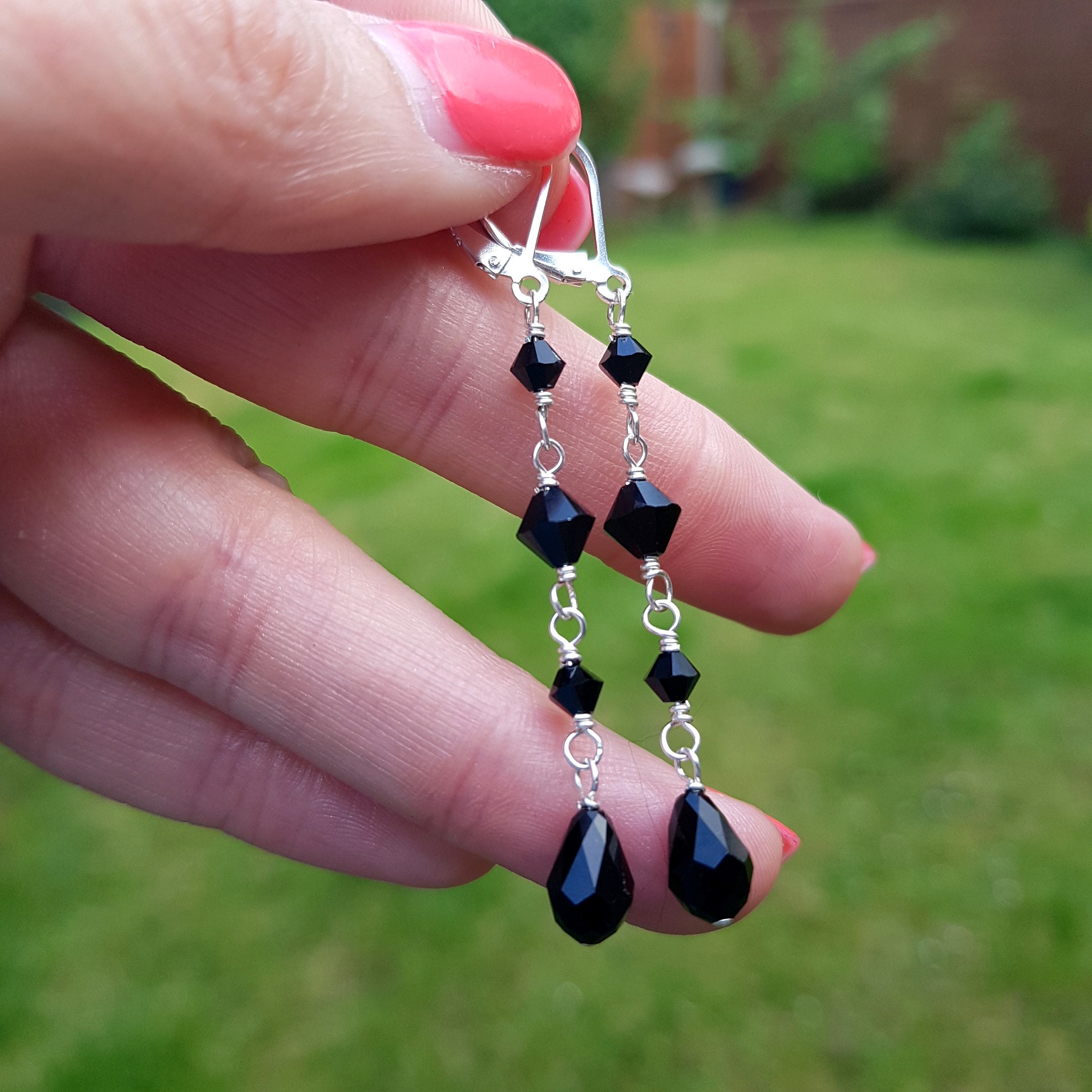 Black crystal best sale earrings swarovski