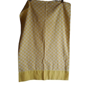 May include: Yellow and white gingham tablecloth with a solid yellow border.