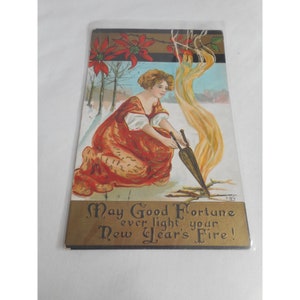 Stara noworoczna pocztówka wysłana pismem Fire Poinsettia 1910