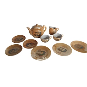 Vintage 10 piece Japan peach lusterware child&#39;s tea set with dragon