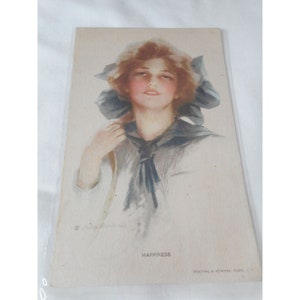 Stara pocztówka z kobietą z 1914 r., wysłana ze znaczkiem „Piękna dama” Szczęście