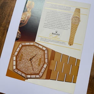 May include: An advertisement for Rolex Cellini watches. The image features two gold watches with diamond accents. One watch has a rectangular face, and the other has an octagonal face. The text in the image is in French.