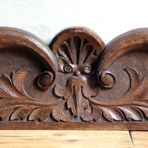 May include: A rustic wooden sign with the text "Welcome to our home" in white lettering. The sign features a distressed finish and a simple, inviting design, perfect for entryway decor.