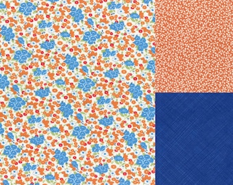 3 fat quarter bundle of coordinating fabrics in blue, orange and red-florals and small print