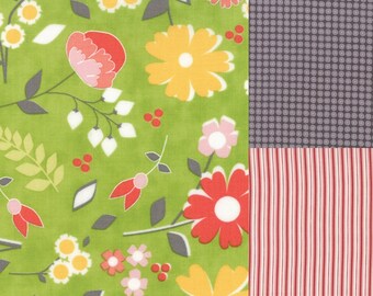 Fat quarter bundle of 3 coordinating floral fabrics in orange, coral, green, pink, yellow and gray by Moda Fabric