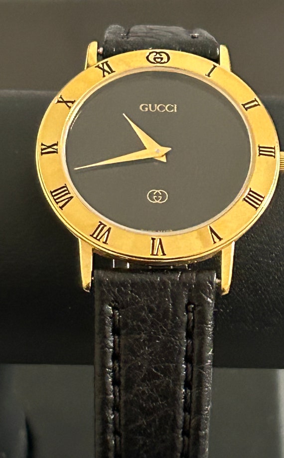 Gucci mens handsome gold watch with a  8" black w… - image 10