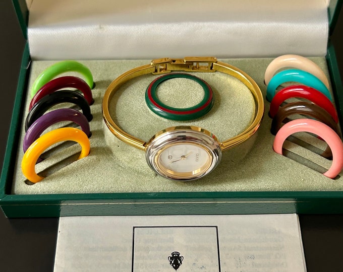 Gucci Fine 6 1/2 Authentic Women's Gold Bangle Watch 12 Gucci Bezels