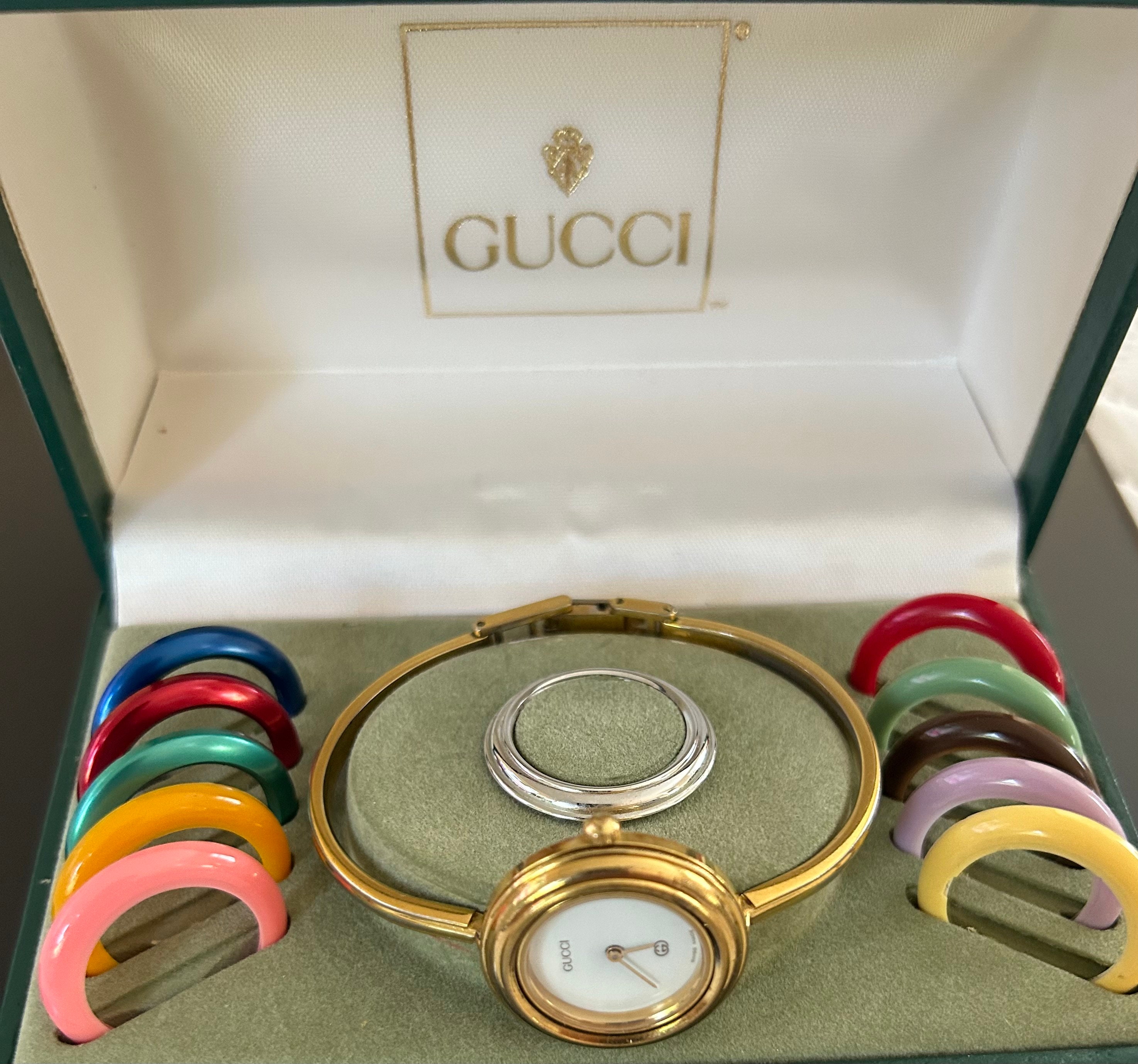 Gucci watch gold bangle top