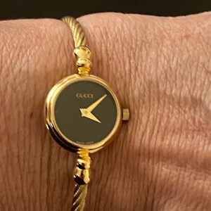 Gucci Lovely Women's Gold Bangle Watch 