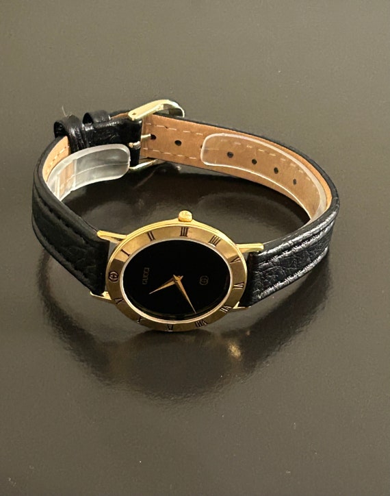 Gucci mens handsome gold watch with a  8" black w… - image 8