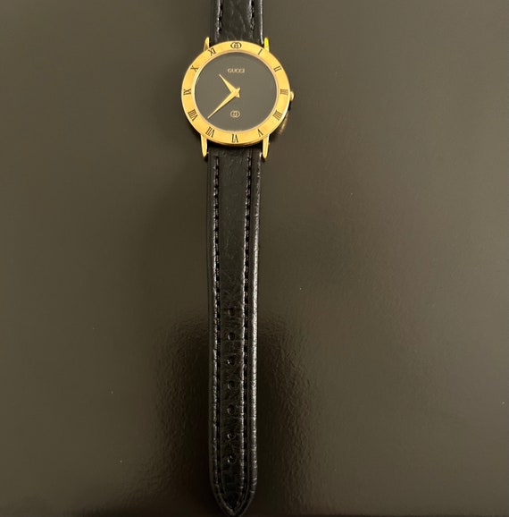 Gucci mens handsome gold watch with a  8" black w… - image 4