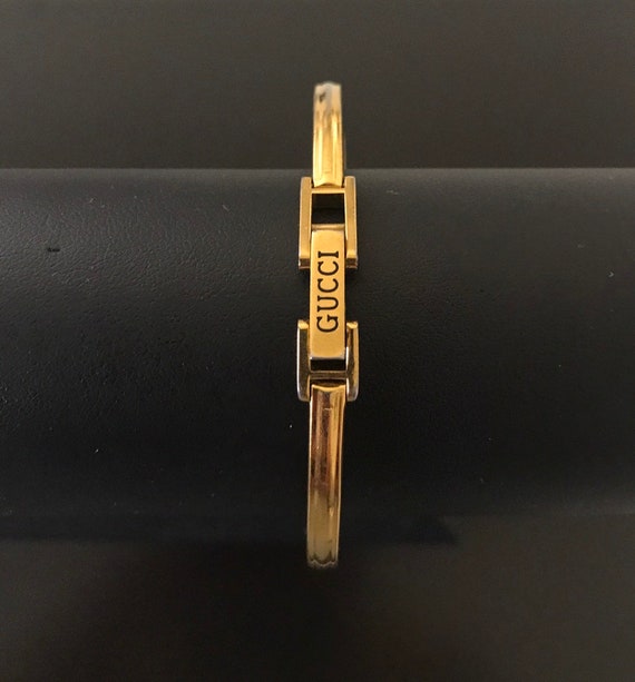 gucci gold bangle watch