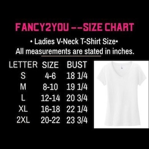 May include: A white V-neck t-shirt next to a size chart. The chart, against a black background, lists sizes S to 2XL with bust measurements in inches. The text "FANCY2YOU -- SIZE CHART" is at the top.