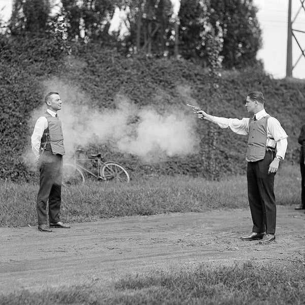 Police Testing Bulletproof Vest, 1923. Vintage Photo Reproduction Print. Black & White Photograph. Gun, Pistol, Shooting, 1920s, 20s.