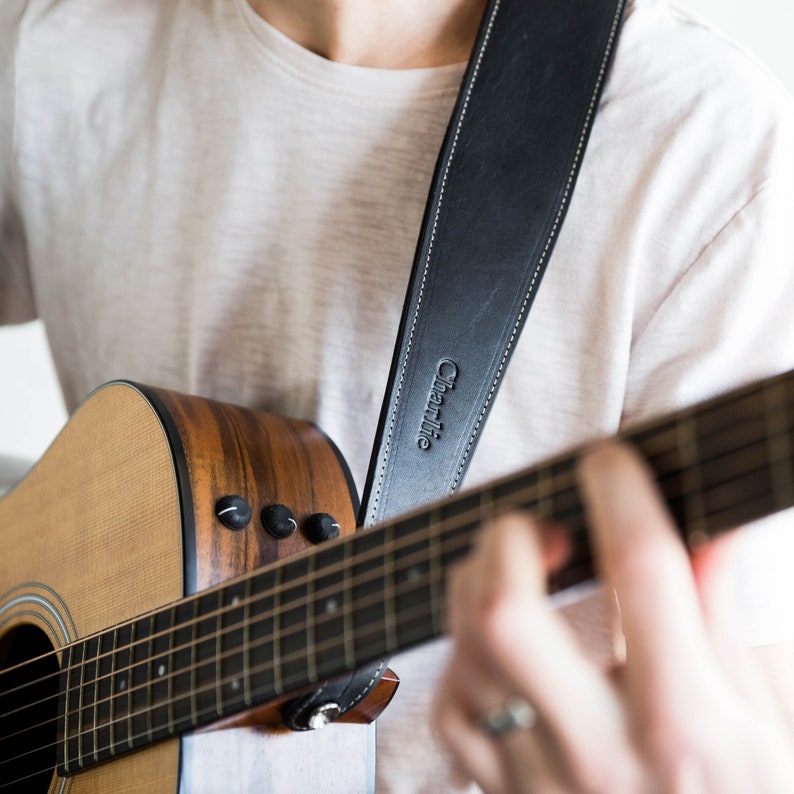 Personalized fine leather guitar strap. Available in black or brown leather.