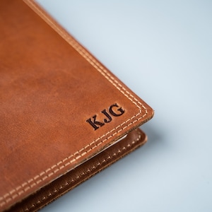 Hand Made Full Grain leather journal cover that comes with a 192 page A5 journal. This journal is handmade and can be personalized with your name or your initials!  Available in cow hide (smooth) and shrunken bison (textured)