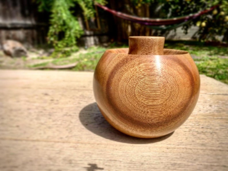 Hand turned juniper hollowform dry vase