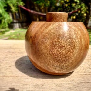 Hand turned juniper hollowform dry vase