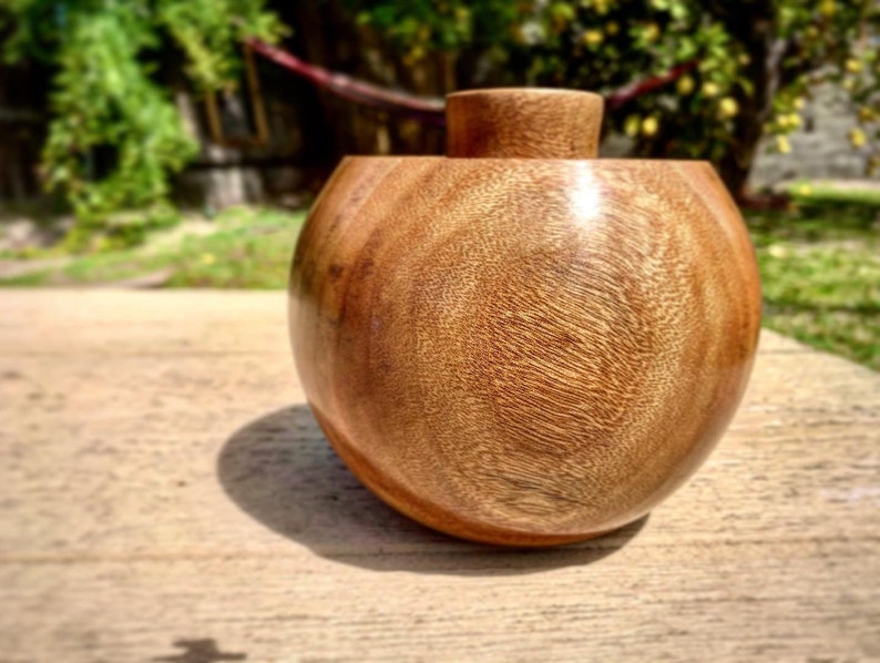 Hand turned juniper hollowform dry vase