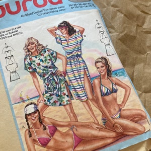 May include: A sewing pattern for a dress and bikini. The pattern includes three different styles: a striped dress with a side slit, a floral print dress with a side slit, and a bikini top and bottom. The pattern is for sizes 34-42.
