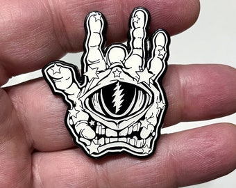 Crazy Fingers 2024 Hatpin. Key Line Black & White Variant. 1.75” Double Posted, Glow. Numbered from just 25 pieces. Garcia inspired.