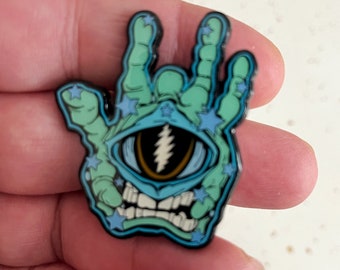 Crazy Fingers 2024 Hatpin. Peacock colorway Variant. 1.75” Double Posted, Glow. Numbered from just 25 pieces. Garcia inspired.