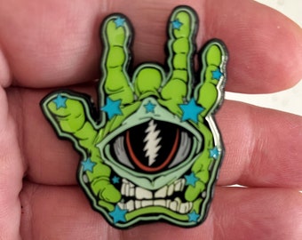 Crazy Fingers 2024 Hatpin. Green Alien Variant. 1.75” Double Posted, Glow. Numbered from just 25 pieces. Garcia inspired.