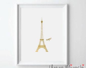 May include: A white framed print with a gold silhouette of the Eiffel Tower and the text "Bonjour!" in gold script. The print is on a white background.
