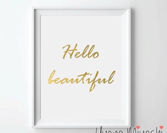 May include: White framed print with gold lettering that reads "Hello beautiful" and the artist's signature "Uyeno Miyoshi" in the bottom right corner.
