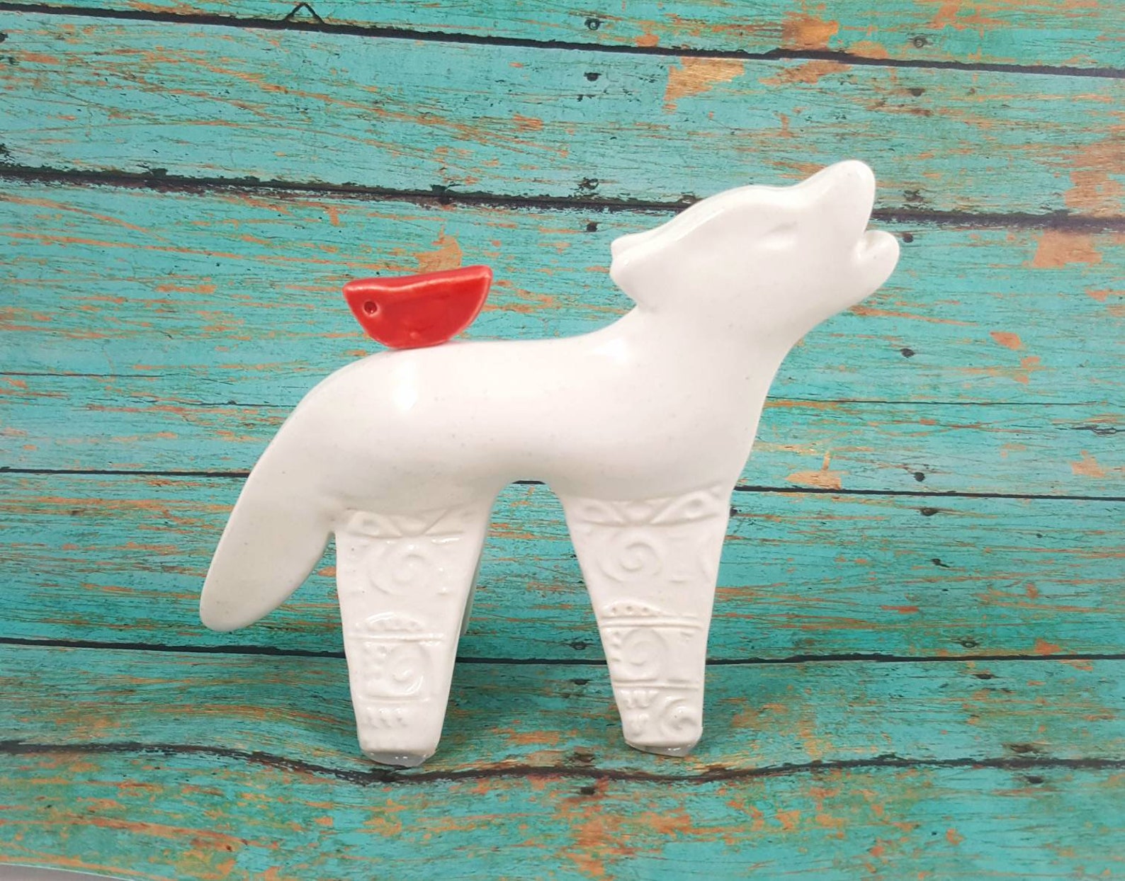 ceramic wolf statue