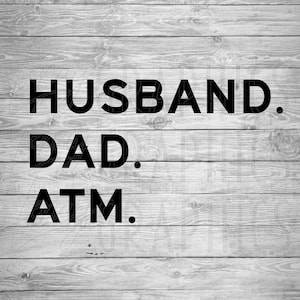 May include: Black text on a woodgrain background reads "Husband. Dad. ATM."