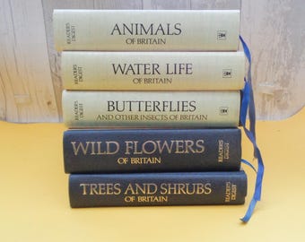 May include: A stack of five vintage Readers Digest books about the wildlife of Britain. The books are titled "Animals of Britain", "Water Life of Britain", "Butterflies and Other Insects of Britain", "Wild Flowers of Britain", and "Trees and Shrubs of Britain".