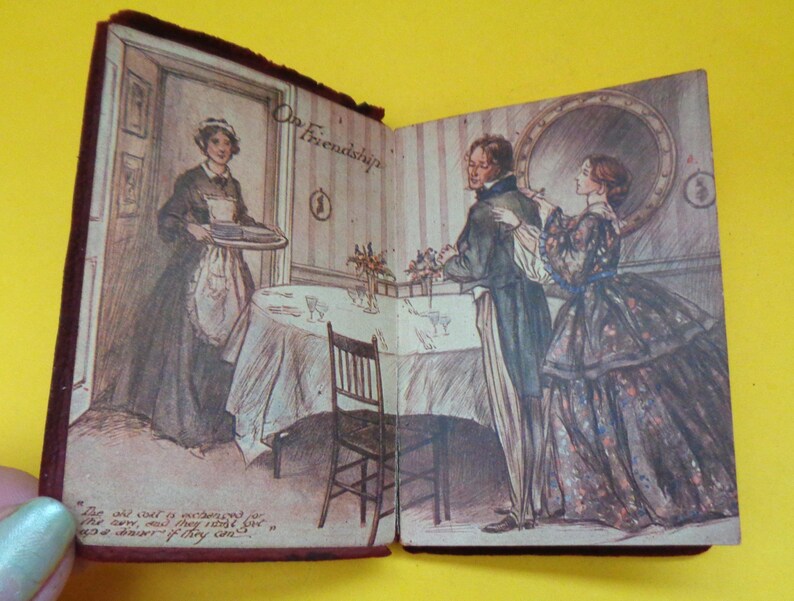 May include: Open book with illustrations of a Victorian-era scene. The left page shows a woman in a maid's uniform carrying a tray. The right page depicts a man and woman in formal attire. Text on the pages reads "On Friendship".