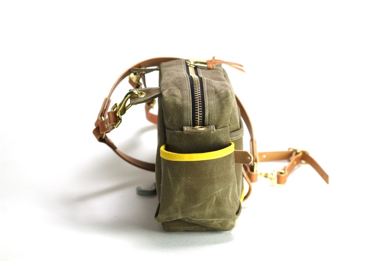Brown Minimalist Waxed Canvas and Leather Fly Fishing Bag with Front Mounted Net Slot and Creel Style Strap