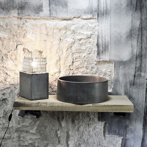 Charcoal Elegance : The Beautifully Brutal Round Washbasin