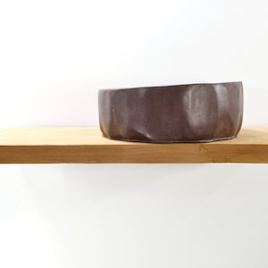 The Asymmetrical Brown Round Washbasin Artistry