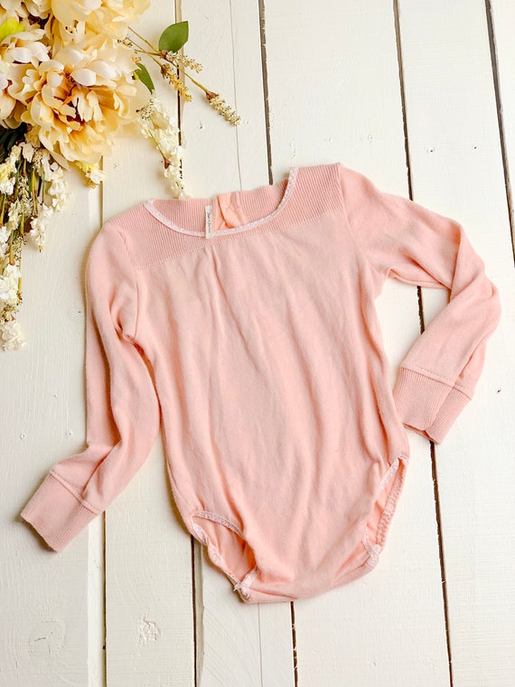 peach sweater outfit