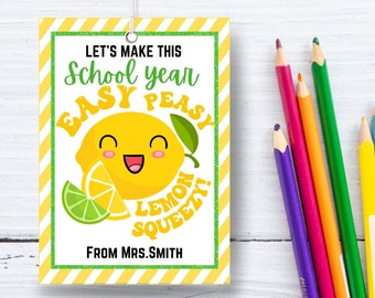 May include: A yellow and white gift tag with a lemon design. The tag says "Let's make this school year easy peasy lemon squeezy!" and "From Mrs. Smith".