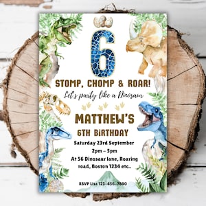 May include: A dinosaur-themed birthday invitation with the number 6 in blue, surrounded by illustrations of various dinosaurs and green foliage. The invitation reads "STOMP, CHOMP & ROAR!" and includes details for Matthew's 6th birthday.