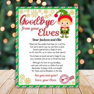 May include: A red and green Christmas card with a cartoon elf holding a gift. The card says "Goodbye from your Elves" and includes a message to Jackson and Ellie. The card also has a red and white stamp that says "Delivered by Reindeer Mail."
