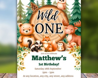 May include: A woodland-themed first birthday party invitation with a brown tree trunk background and the text "Wild One". The invitation features a variety of woodland animals, including a bear, fox, owl, and deer. The text "Matthew's 1st Birthday!" is printed in green and the date and time of the party are listed below.