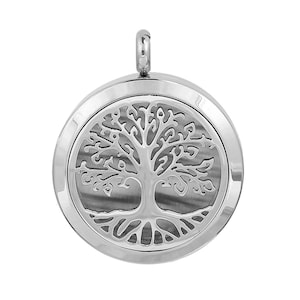 May include: Silver pendant with a tree of life design. The pendant is round and has a smooth, polished finish.